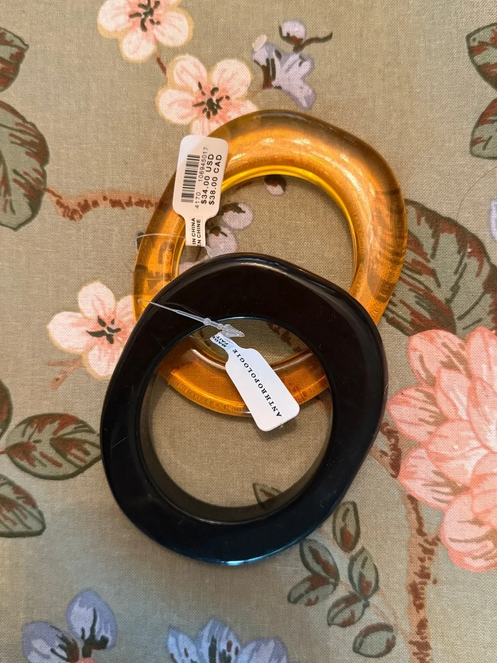 Anthropologie Amber and Black Resin Bangles
